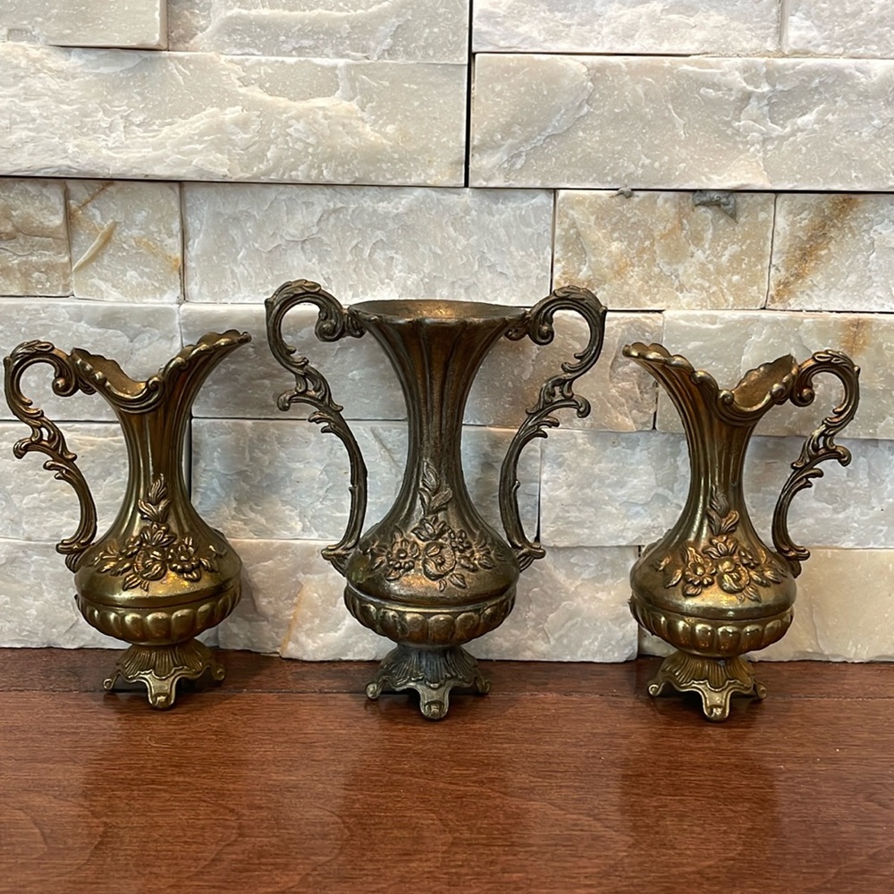 Antique brass footed pitchers from Italy